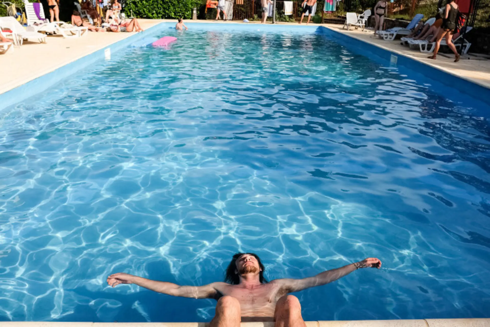Relaxing by the pool