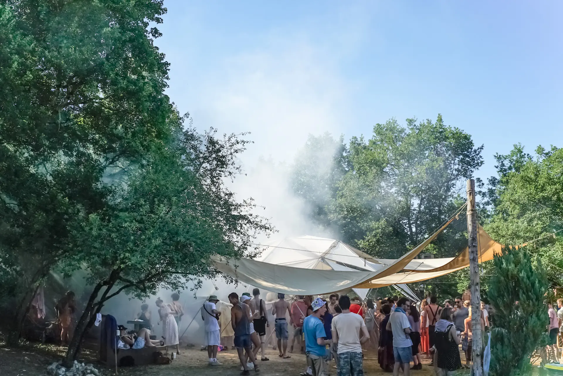 Daytime gathering with shade sails